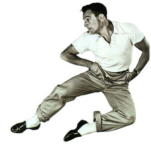 Gene Kelly in loafers and rolled pants