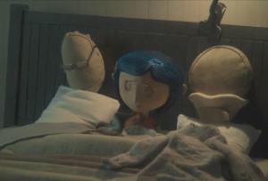 Coraline and pillow parents in bed